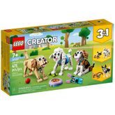 LEGO Creator 3in1 Adorable Dogs construction set featuring a beagle, poodle, and Labrador with accessories like a food bowl and ball, set outdoors.